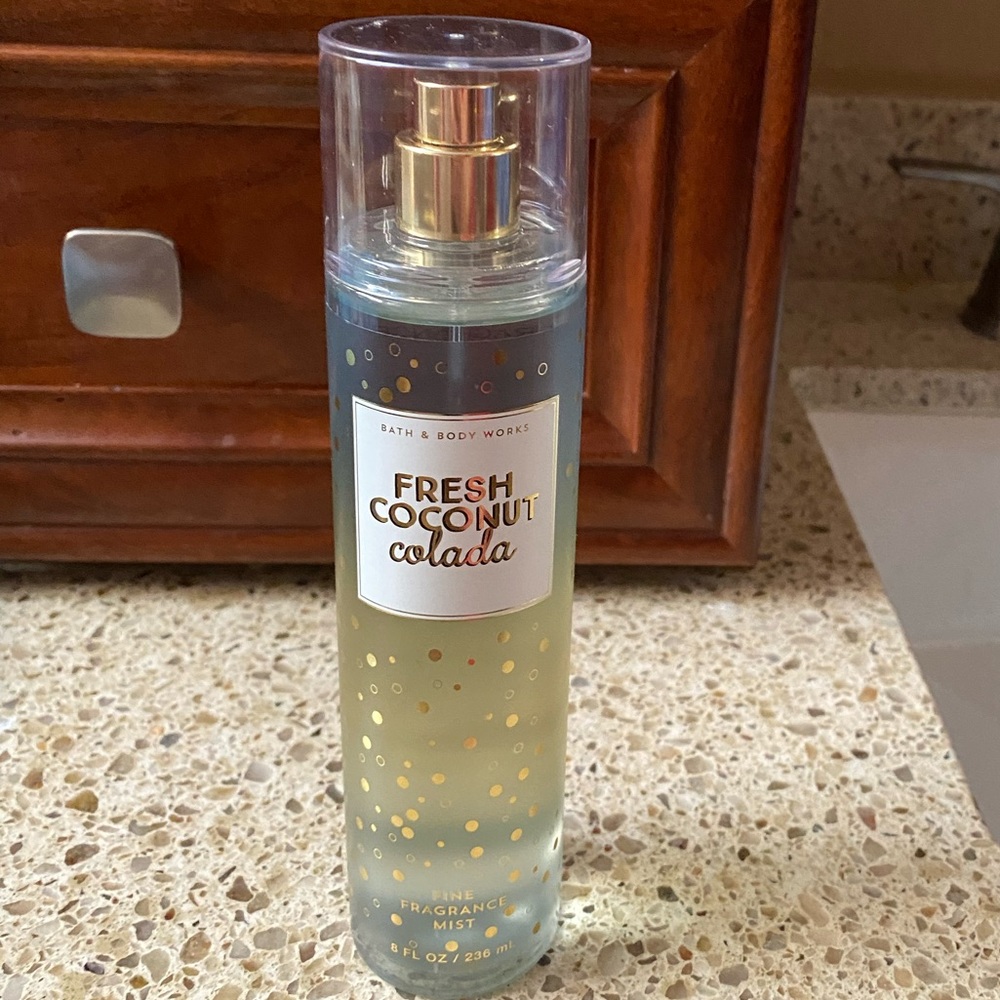 Brand New 8 oz bottles of bath & Body Works body Spray “ Fresh Coconut Colada”